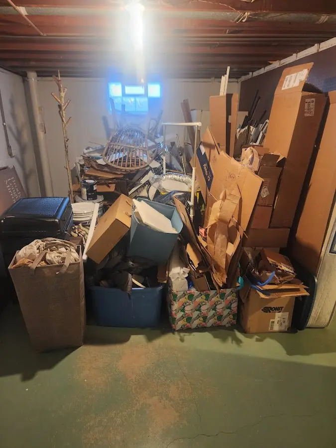 Roll-off dumpster container at job site for Roll Off Dumpster Rental in Forest Hills